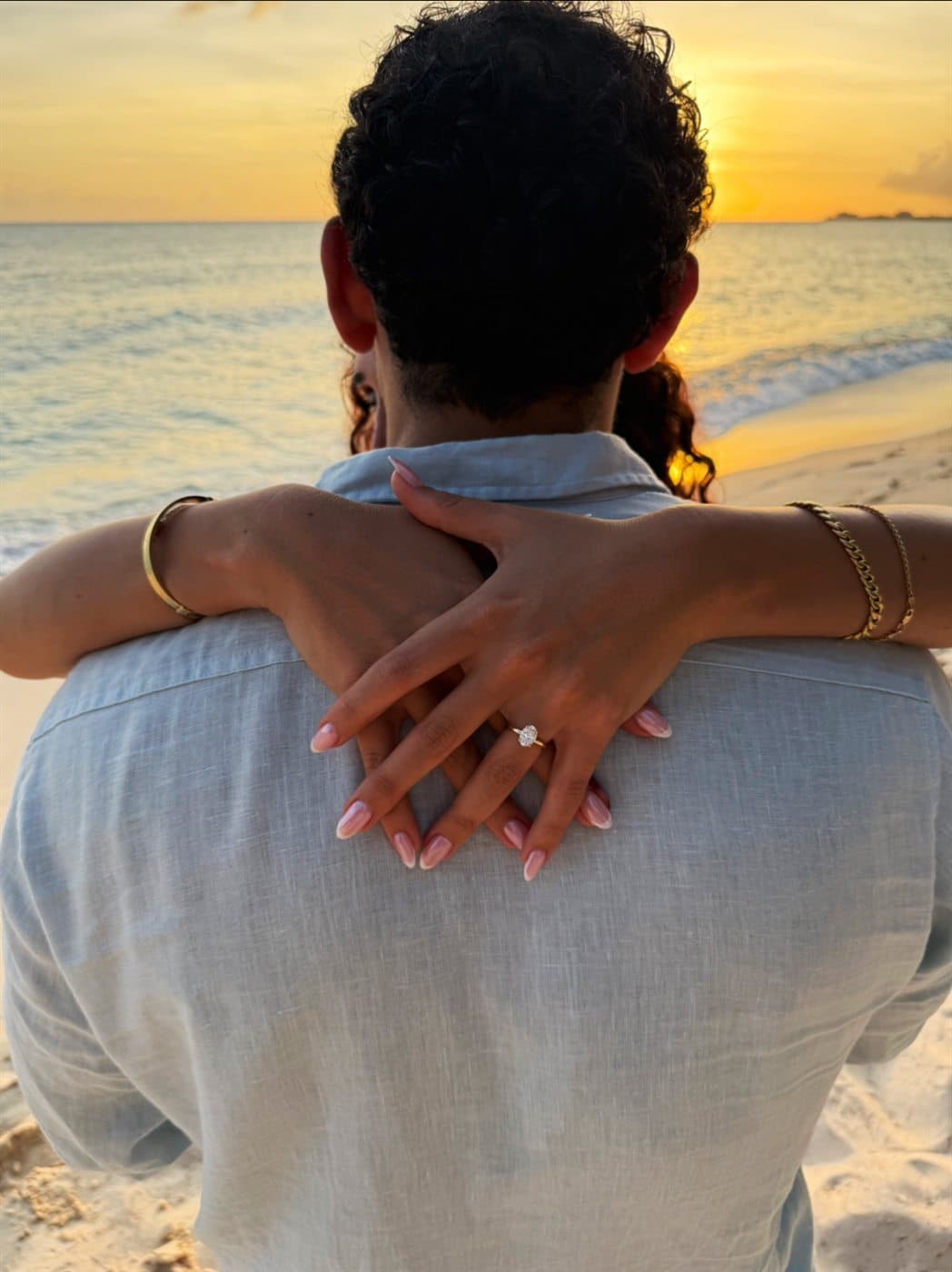 Maise's engagement ring at sunset
